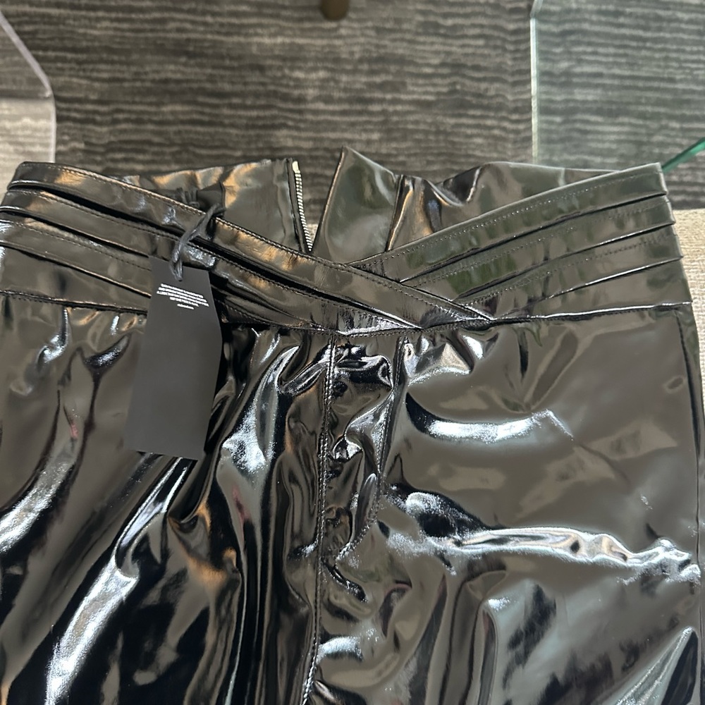 Brand new black faux leather high waisted!! Size 26 R + A